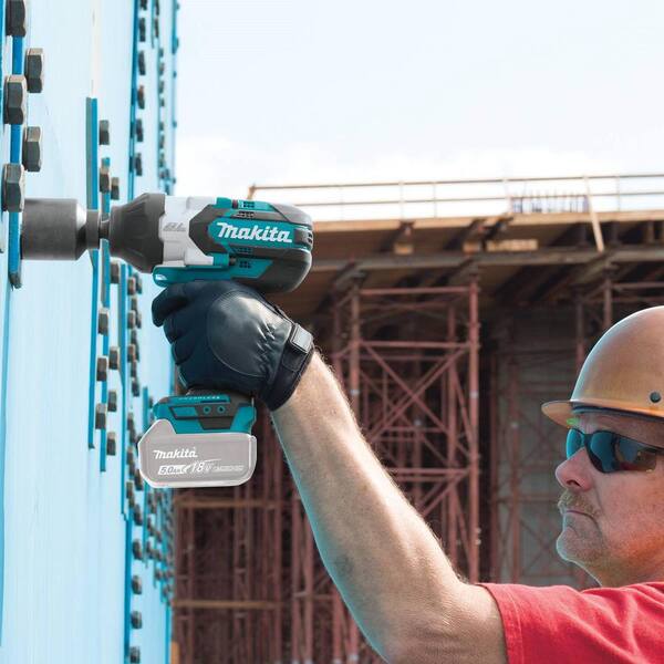 Makita 18V LXT Brushless 4-1/2 in./5 in. Cut-Off/Angle Grinder and 18V 7/8  in. SDS-Plus Concrete/Masonry Rotary Hammer Drill XAG04Z-XRH04Z - The Home  Depot