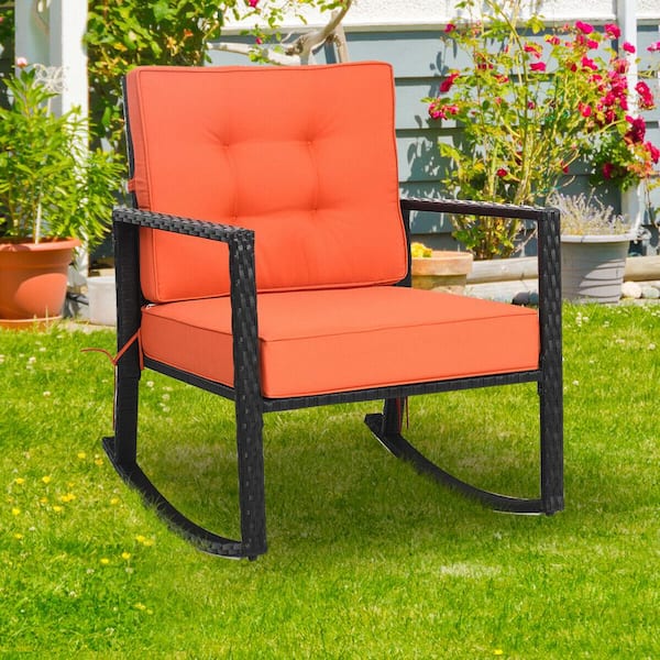 ANGELES HOME Black Wicker Rattan Outdoor Rocking Chair with Orange Cushions