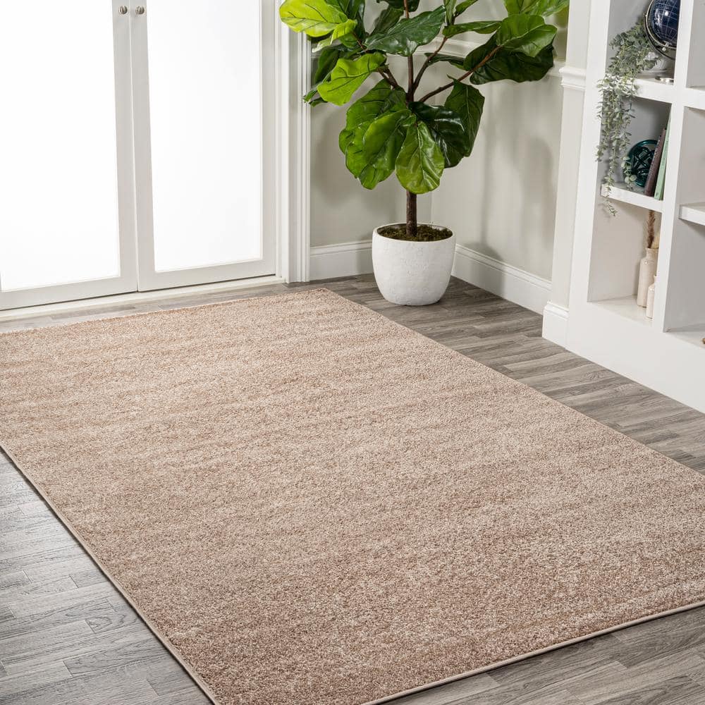 Beige 12' x 15' Solid Synthetic Low-Pile Area Rug