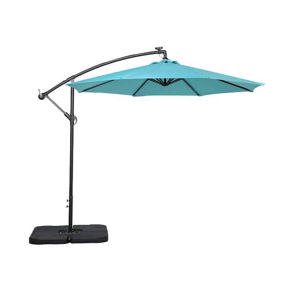 WESTIN OUTDOOR Bayshore 10 ft. Outdoor Patio Crank Lift LED Solar Powered Cantilever Umbrella with 4-Piece Base Weights in Turquoise