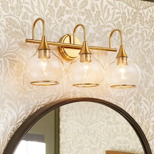 Worton 22.8 in. 3-Light Modern Brushed Brass Bathroom Vanity Light Farmhouse Wall Sconce with Clear Glass Globe Shades