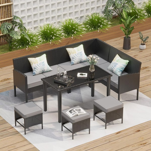 Black 7-Piece Wicker Outdoor Sectional Set with Gray Cushions and Table