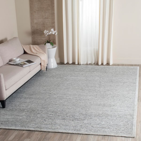 Tibetan 9 ft. x 12 ft. Gray Solid Color Area Rug