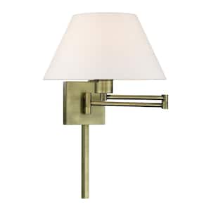 Atwood 1-Light Antique Brass Plug-In/Hardwired Swing Arm Wall Lamp with Off-White Fabrick Shade