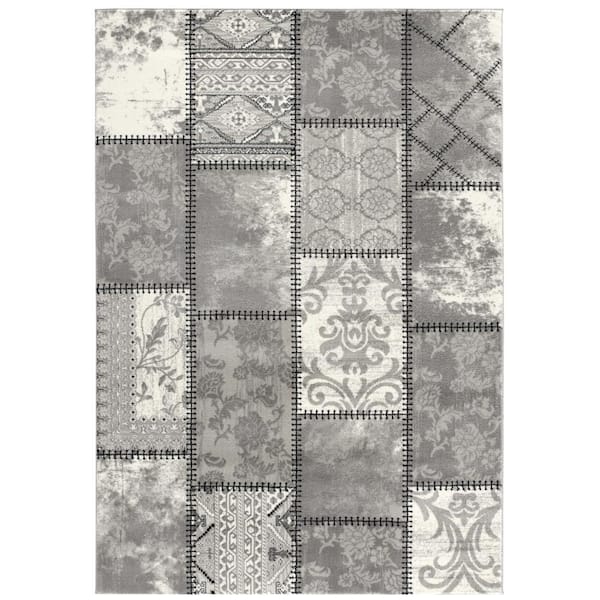 7 X 9 Gray and Ivory Damask Power Loom Area Rug