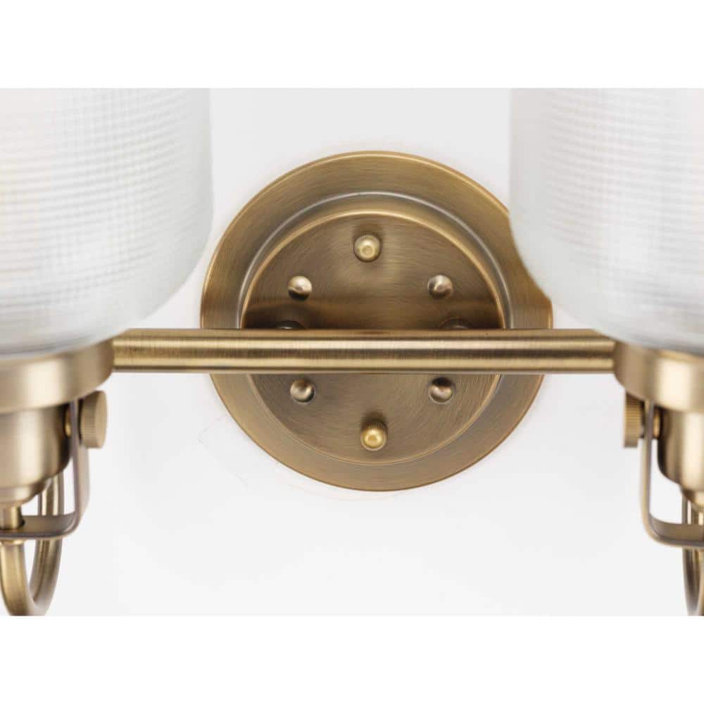 Vintage Brass Four-Light Bathroom Vanity Fixture with Prismatic Glass Shades