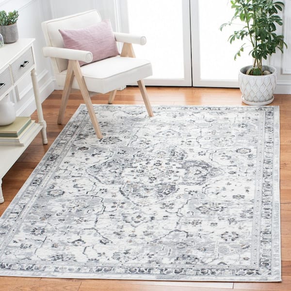 Shivan 5 ft. x 7 ft. Ivory/Gray Distressed Border Medallion Area Rug