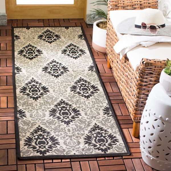 Courtyard Sand/Black 2 ft. x 7 ft. Floral Indoor/Outdoor Patio  Runner Rug