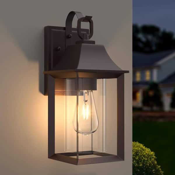 Decorators 14 in. Oil Rubbed Bronze Farmhouse Cylinder Dusk to Dawn Outdoor Hardwired Cylinder Glass Sconce
