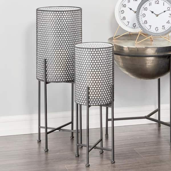 Litton Lane Modern Style Round White and Black Metal Floor Lantern Candle with Pierced Metal Pattern