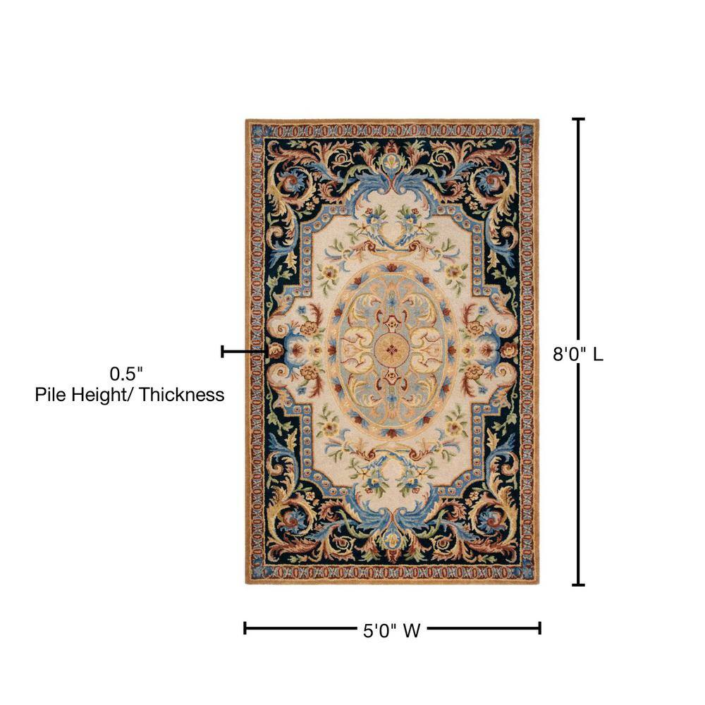Ivory and Navy Handmade Wool Floral Area Rug