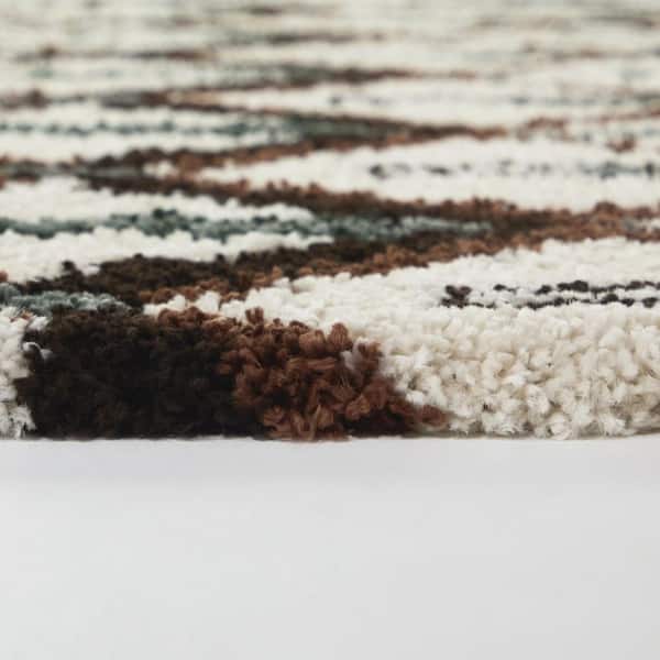 Behring Cream 5 ft. 3 in. x 7 ft. Trellis Area Rug