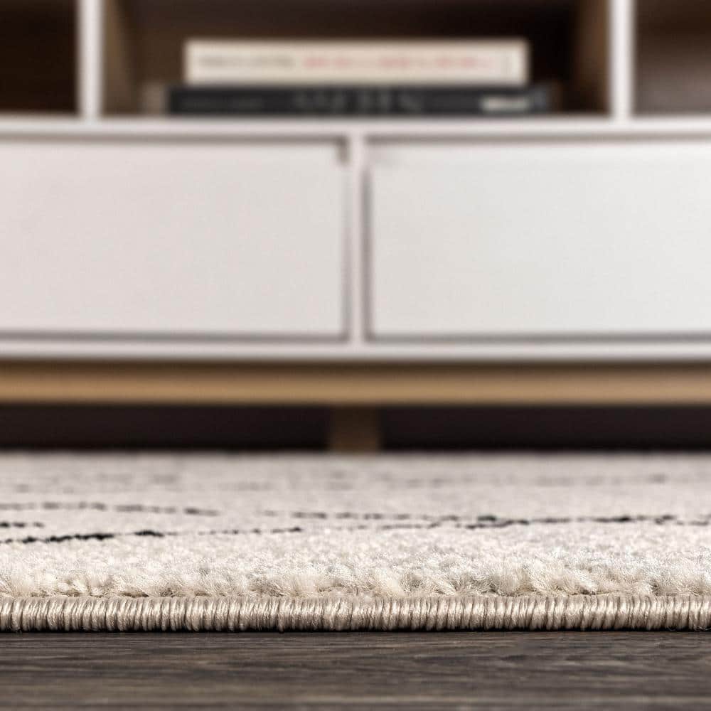Cream and Black Geometric Synthetic 3' x 5' Area Rug