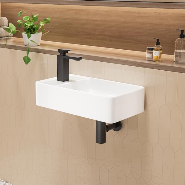 https://images.thdstatic.com/productImages/1e5f09b0-243a-4bde-b8c1-fab05060354f/svn/crisp-white-eridanus-wall-mount-sinks-eri-wb-101l-a0_600.jpg