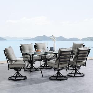 Lavallette 7-Piece Steel Outdoor Dining Set with Silver Linings Cushions, Swivel Rockers and a Glass-Top Table
