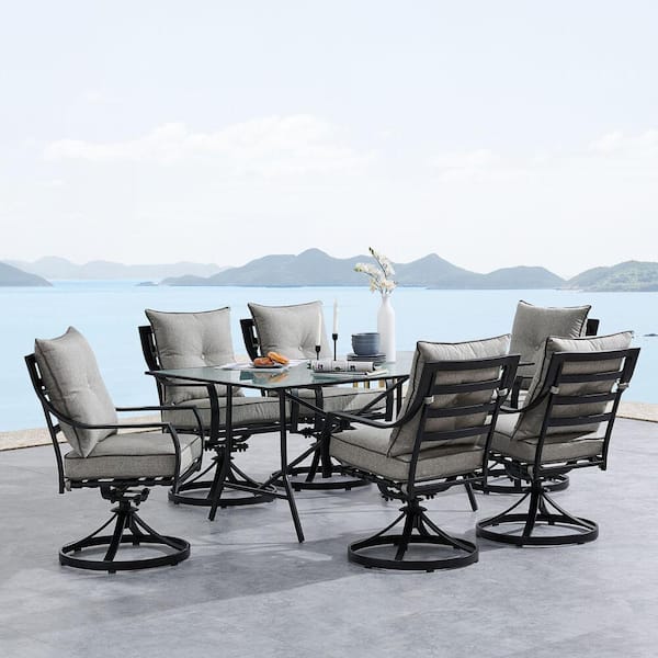 Hanover Lavallette 7-Piece Steel Outdoor Dining Set with Silver Linings Cushions, Swivel Rockers and a Glass-Top Table