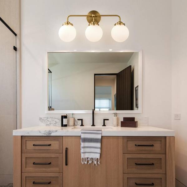 https://images.thdstatic.com/productImages/1e8f1181-cce0-460e-85ef-5efe4f87195d/svn/brass-edislive-vanity-lighting-81010000045868-c3_600.jpg