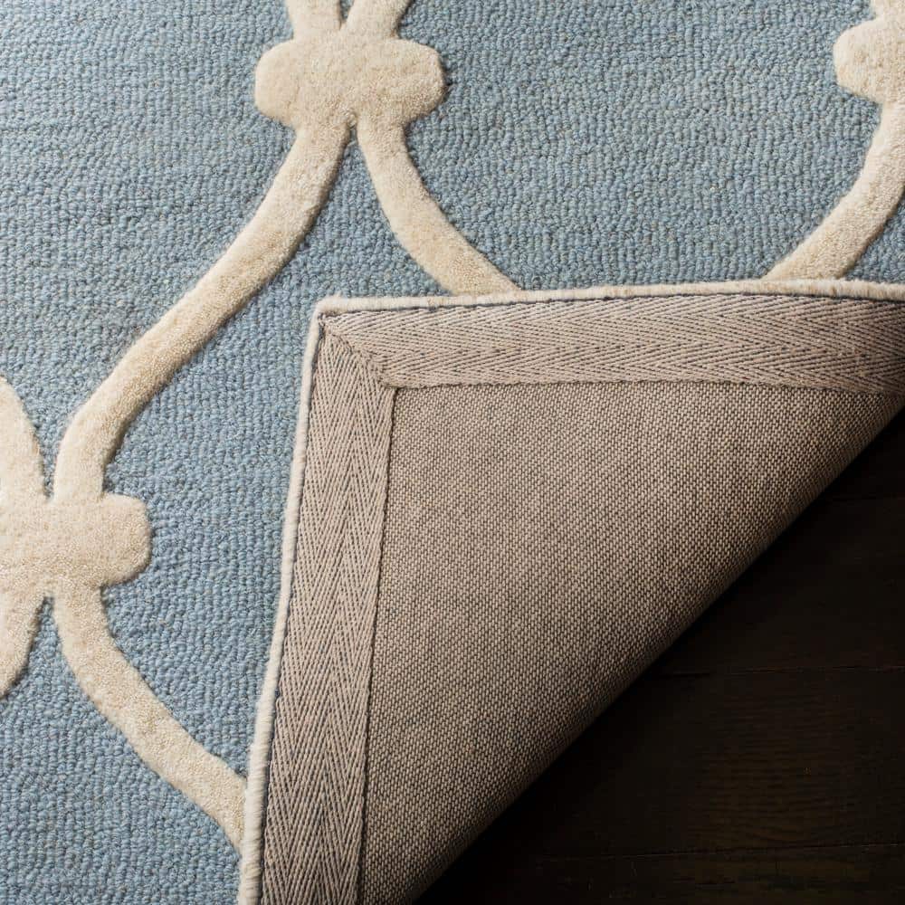 Hand-Tufted Blue and Ivory Wool Geometric Area Rug, 2' x 3'
