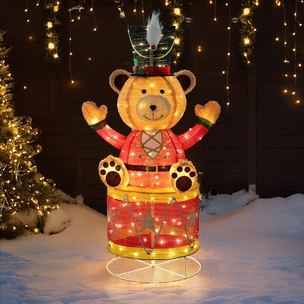 Sunjoy 57 in. Christmas Lighted Drumming Bear, 3D Tinsel Santa