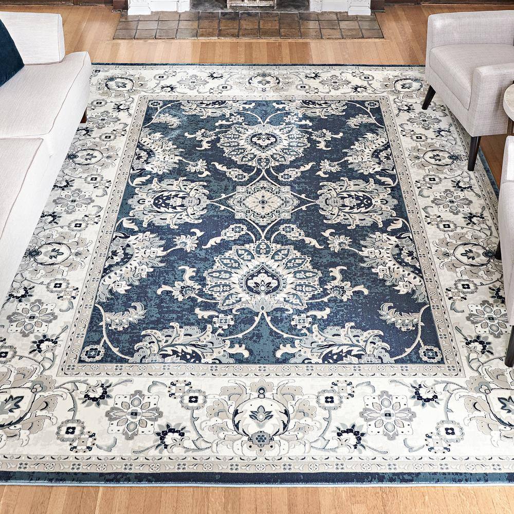 Moena Navy Blue and Ivory Synthetic Persian Area Rug