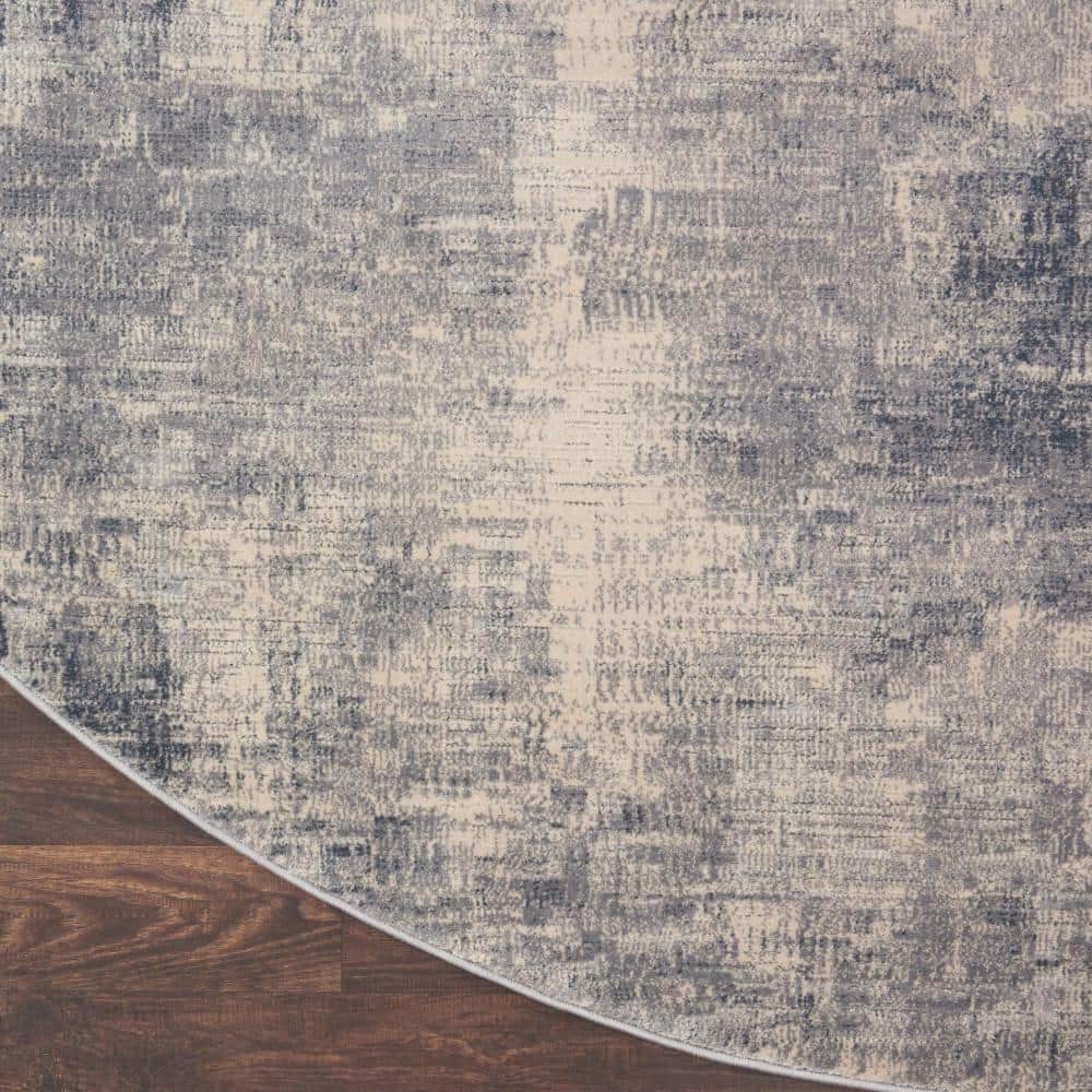 Round Blue and Ivory Abstract Area Rug 7'10"