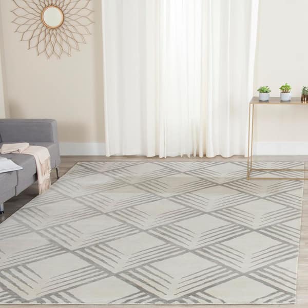 Tibetan 8 ft. x 10 ft. Ivory/Silver Geometric Peaks Area Rug