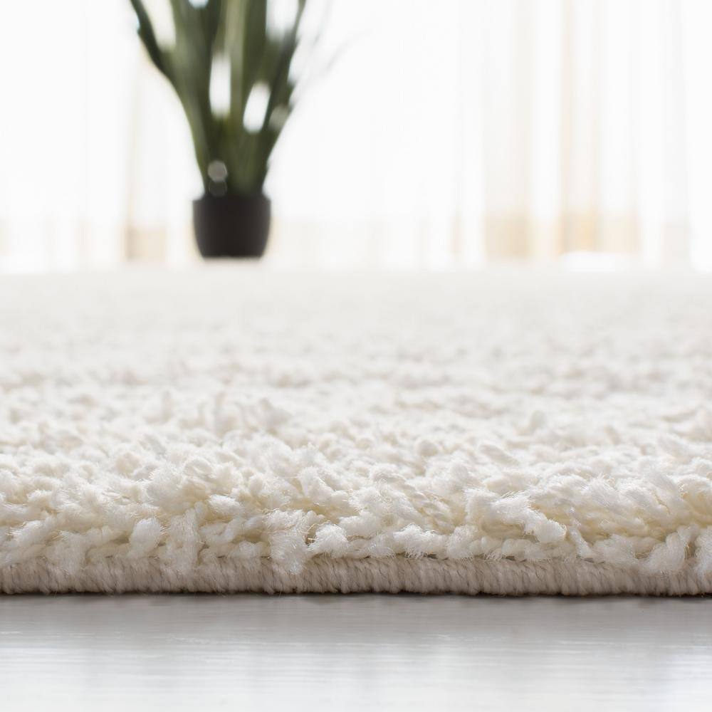 Ivory Bliss 4' x 6' Hand-Knotted Synthetic Shag Area Rug