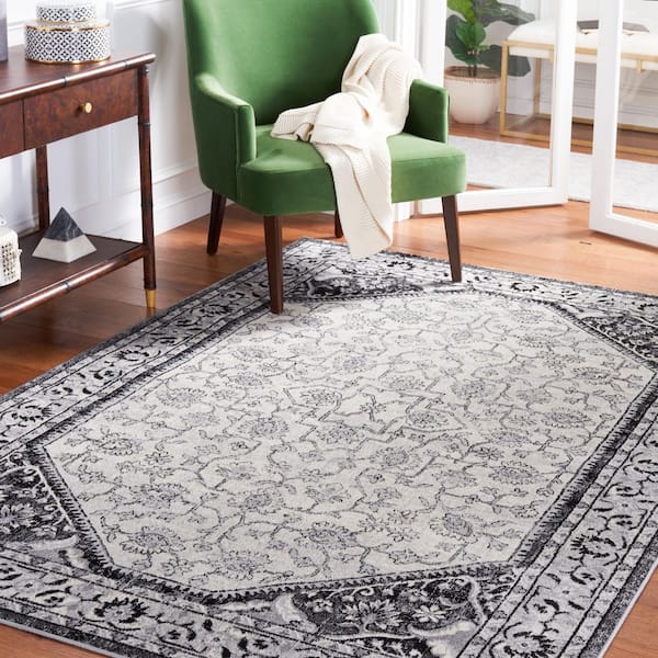 Brentwood 9 ft. x 12 ft. Black/Ivory Oriental Ornate Border Area Rug