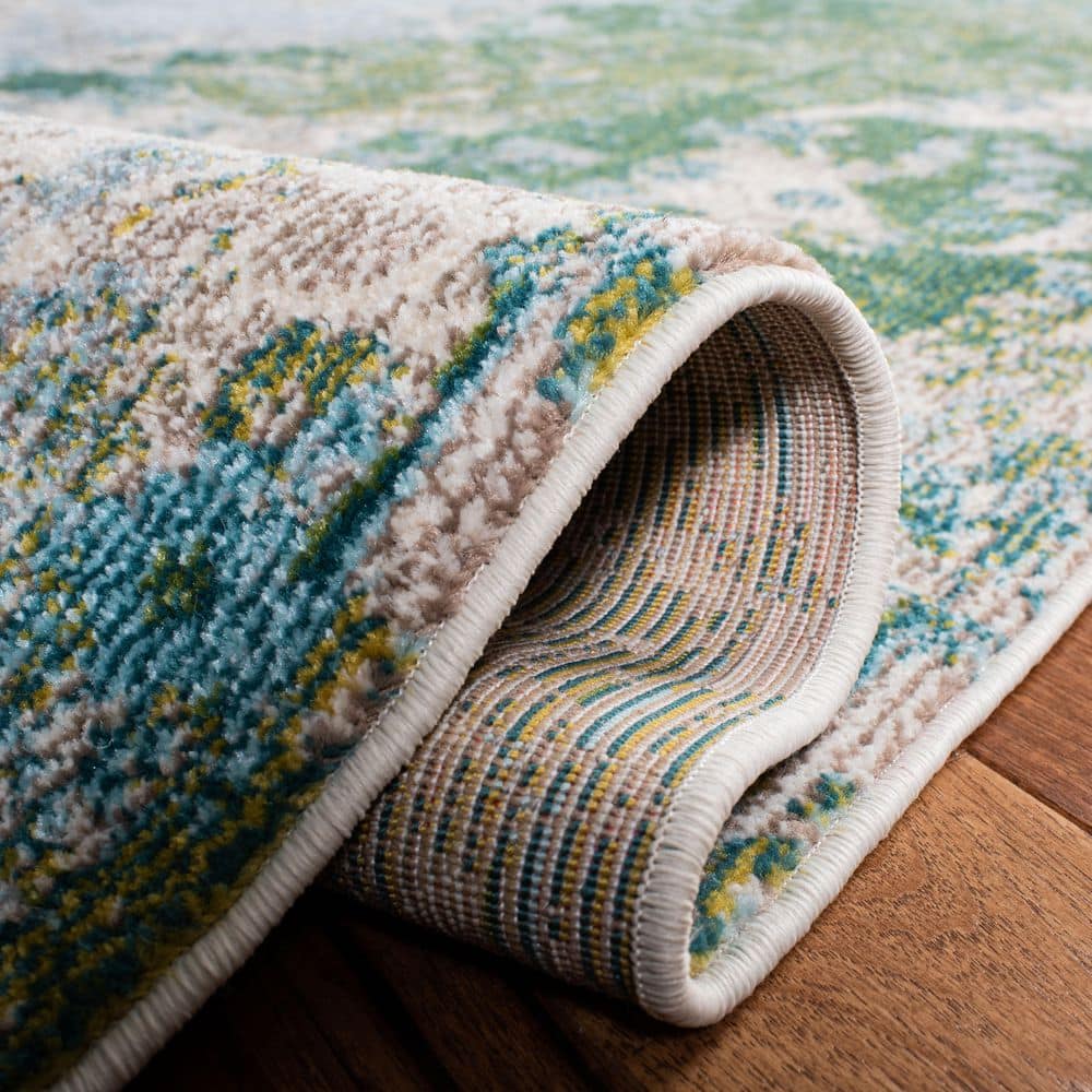 Monaco Green and Turquoise Abstract 9' x 12' Synthetic Area Rug