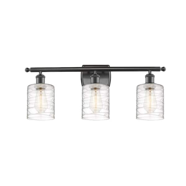 Innovations Cobbleskill 26 in. 3-Light Oil Rubbed Bronze Vanity Light with Deco Swirl Glass Shade