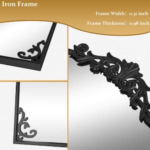 24 in. W x 38 in. H Arched Black Metal Framed with Carved Decoration Wall Mirror Vanity Mirror