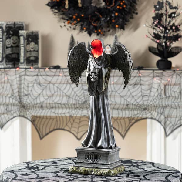 24 in. H Lighted Halloween Grim Reaper Resin Porch Decor with Timer