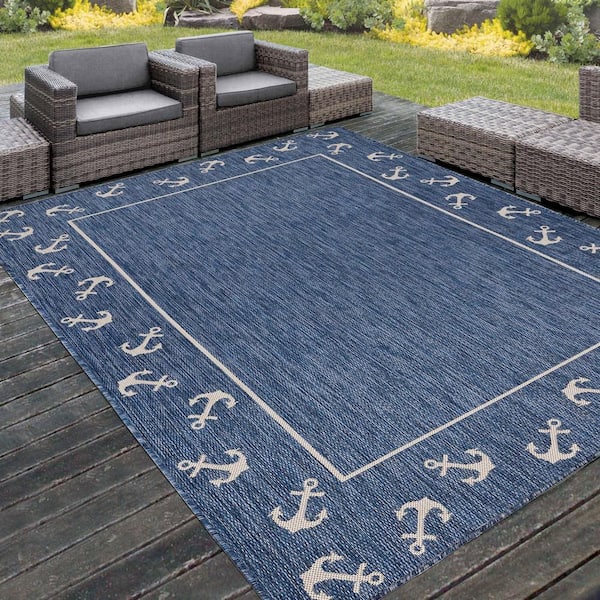 https://images.thdstatic.com/productImages/1f7c08ee-b378-45a7-8710-f16e45dc88b9/svn/navy-blue-white-lr-home-outdoor-rugs-9638a0084d9348-31_600.jpg