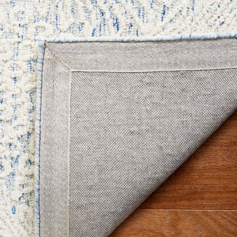Blue Ivory Hand Tufted Wool 4' x 6' Area Rug