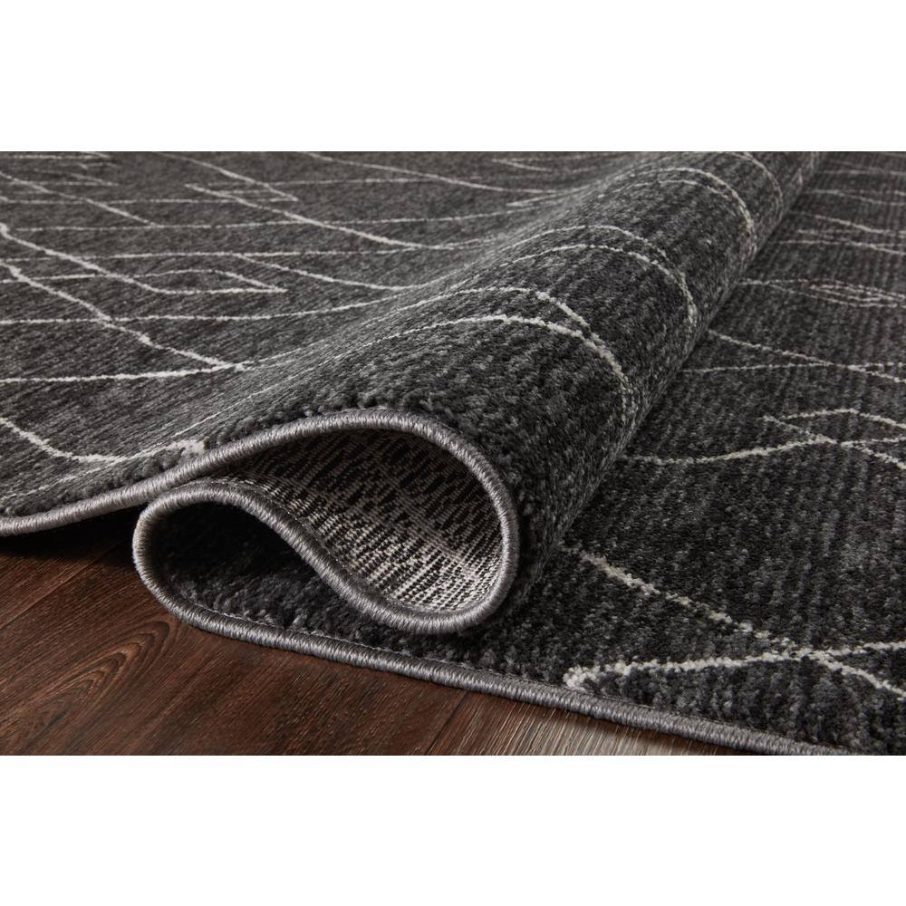 Handmade Vance Rectangular Black Viscose 5'3" x 7'9" Easy-Care Rug