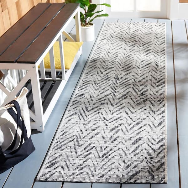 Courtyard Gray/Black 2 ft. x 5 ft. Distressed Chevron Indoor/Outdoor Runner Rug