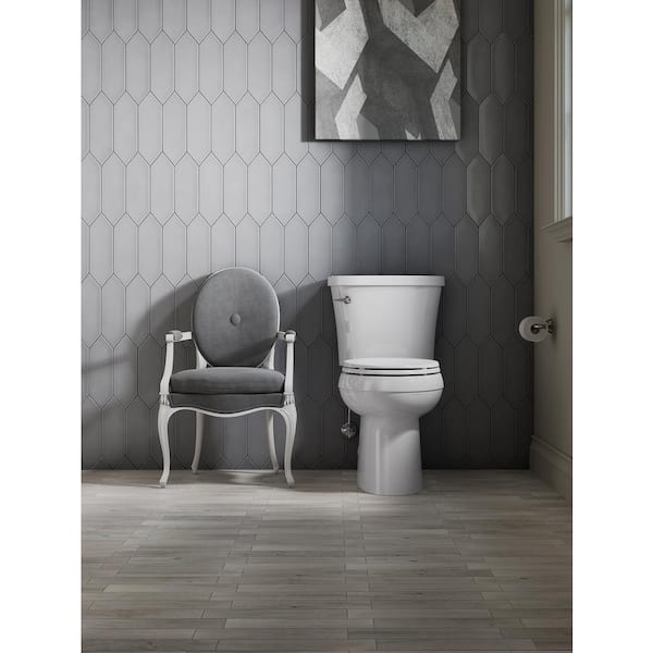 Gleam 12 in. Rough In 2-Piece 1.28 GPF Single Flush Elongated Toilet in White Seat Not Included
