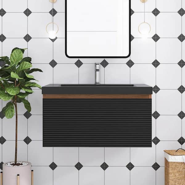 Boosicavelly 30 in. W x 20 in. D x 16 in. H Single Sink Wall-Mounted Bath Vanity in Mature Oak with Black Resin Top