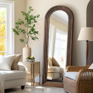 21 in. W x 64 in. H Classic Arched Solid Wood Framed Leaning Mirror in Brown