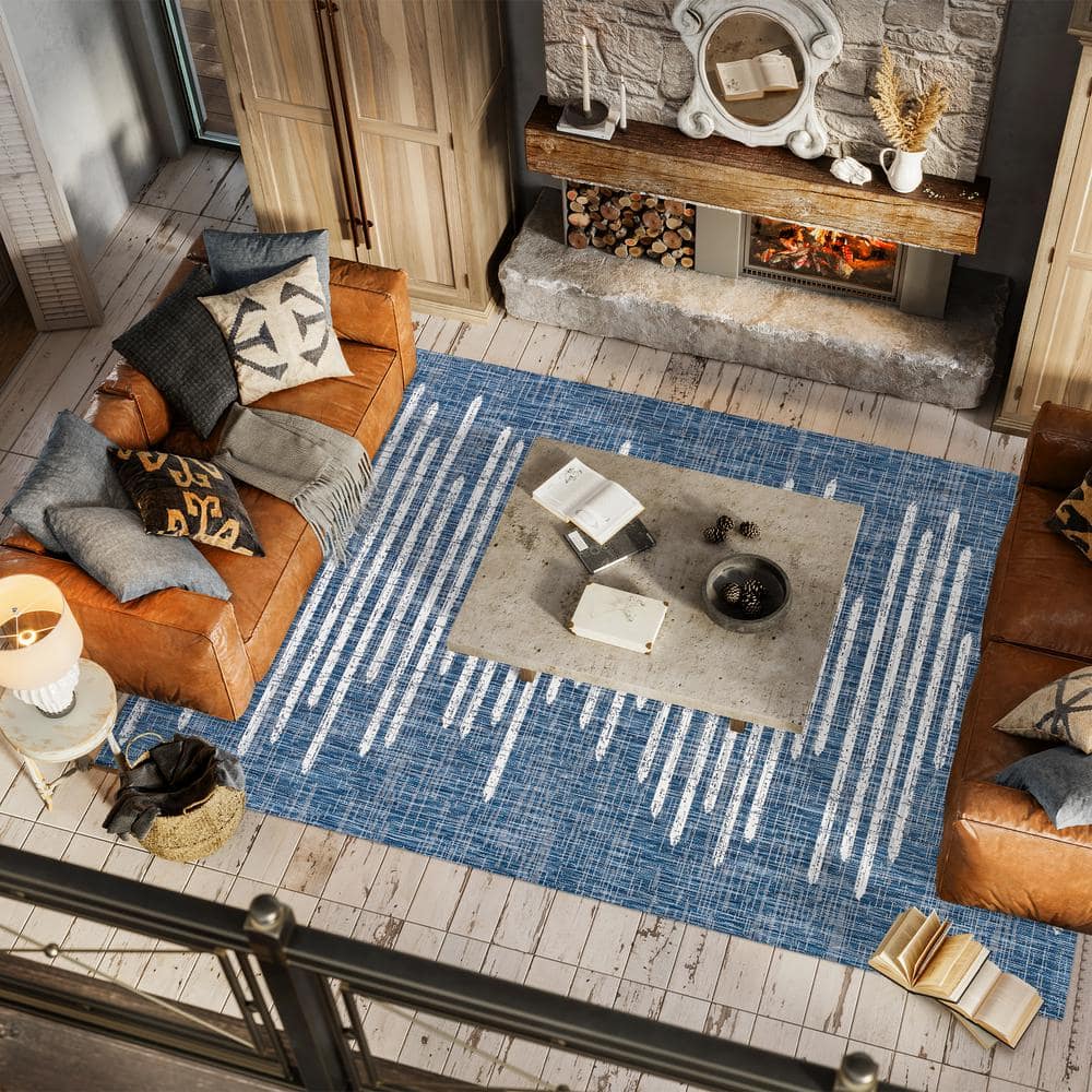 Bohemian Stripe Blue and Ivory Synthetic Area Rug 5' x 8'