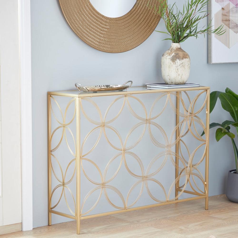 Harper Gold 42" Mirrored Metal Console Table with Quatrefoil Design