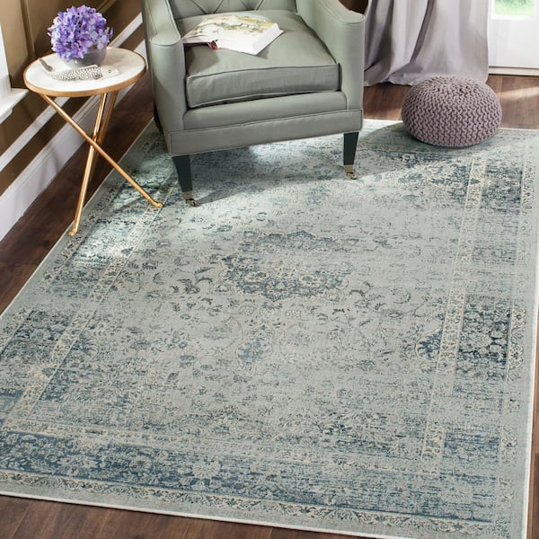 Vintage 7 ft. x 9 ft. Light Blue Distressed Floral Border Area Rug