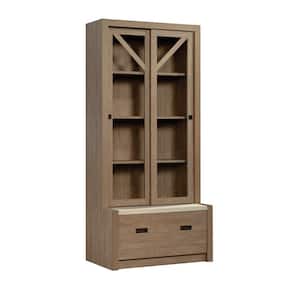 Dixon City 32.992 in. Wide Brushed Oak 4-Shelf Standard Bookcase with Framed Sliding Doors and Drawer