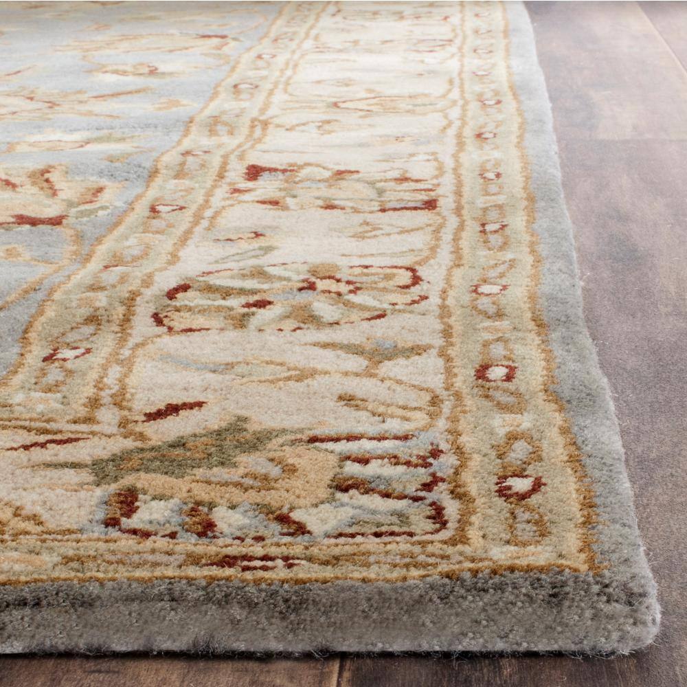 Handmade Blue and Beige Wool Tufted Accent Rug