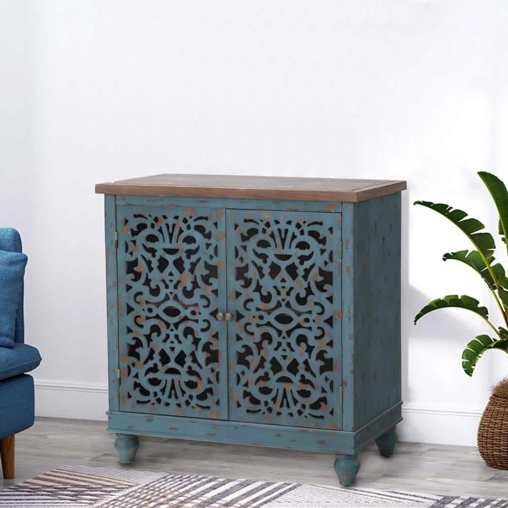 Three-quarter view of the blue rustic accent storage cabinet.