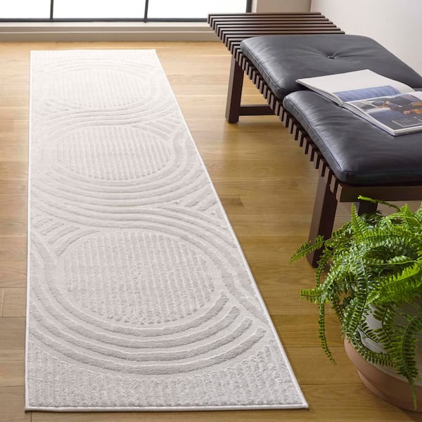 Saylor 2 ft. x 8 ft. Ivory Solid Swirl Striped Runner Rug