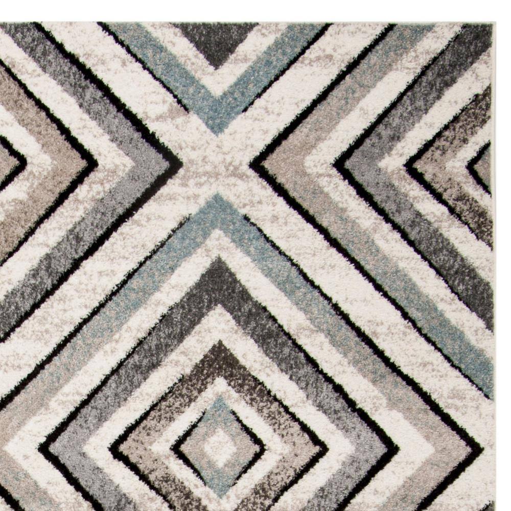 Cream and Beige Geometric Diamond Area Rug 6'7" x 9'2"