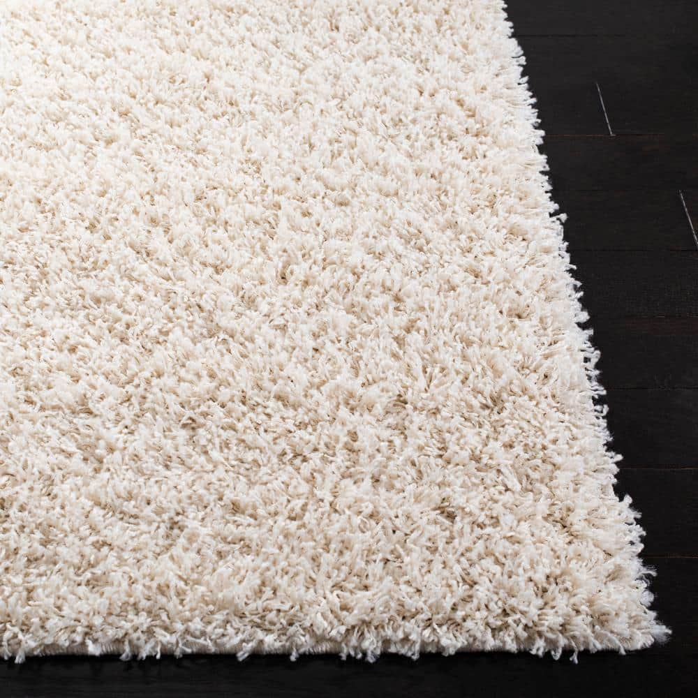 Elysian Ivory 9' x 12' Hand-Knotted Shag Area Rug