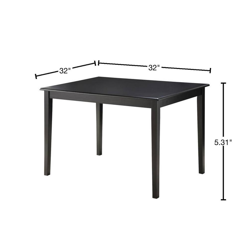 Black dining table with dimension overlays showing width and height.
