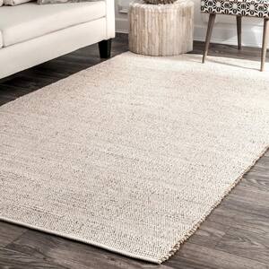 Elfriede Solid Jute Natural 2 ft. x 3 ft. Area Rug